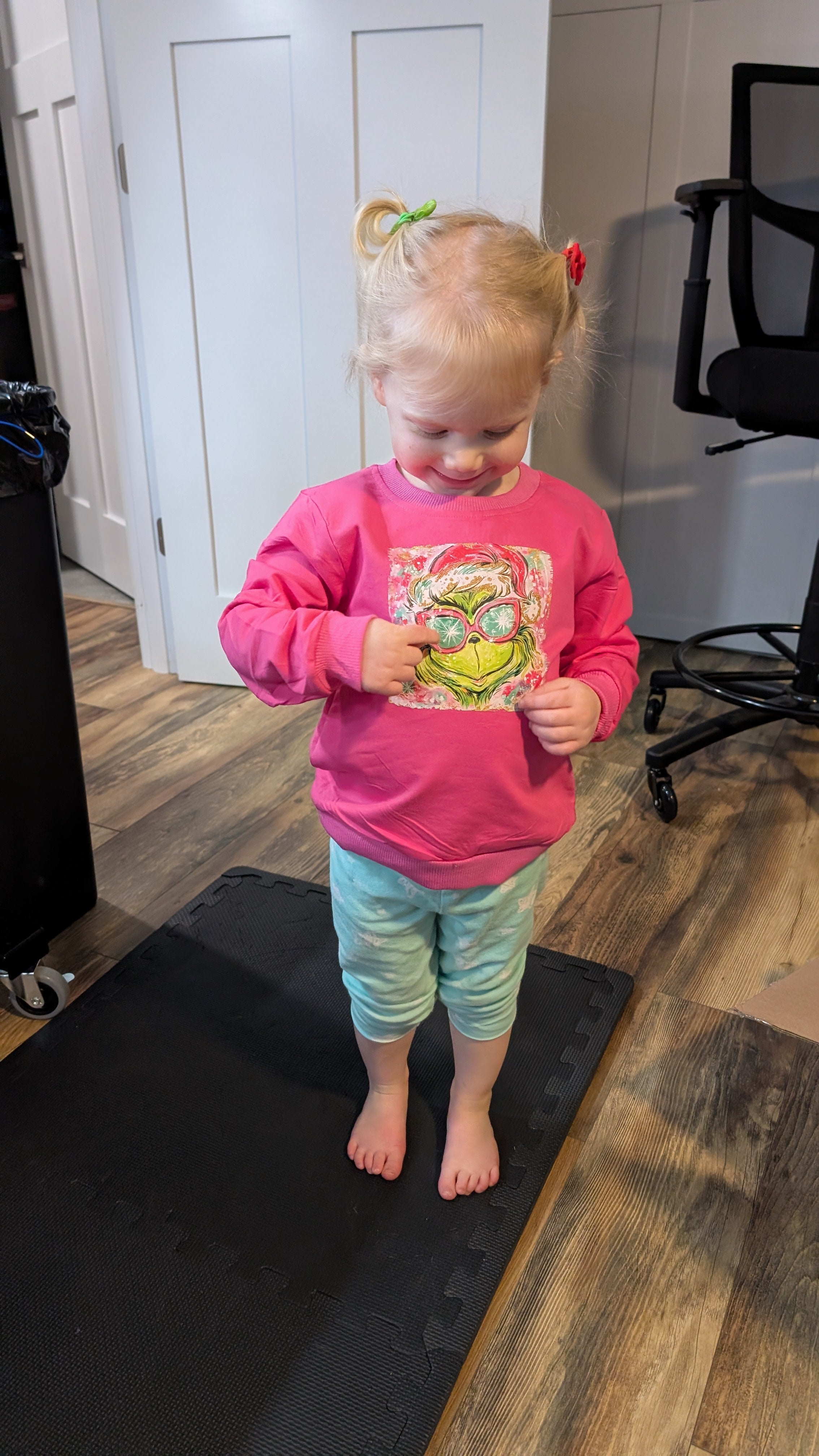 Child with grinch stuff