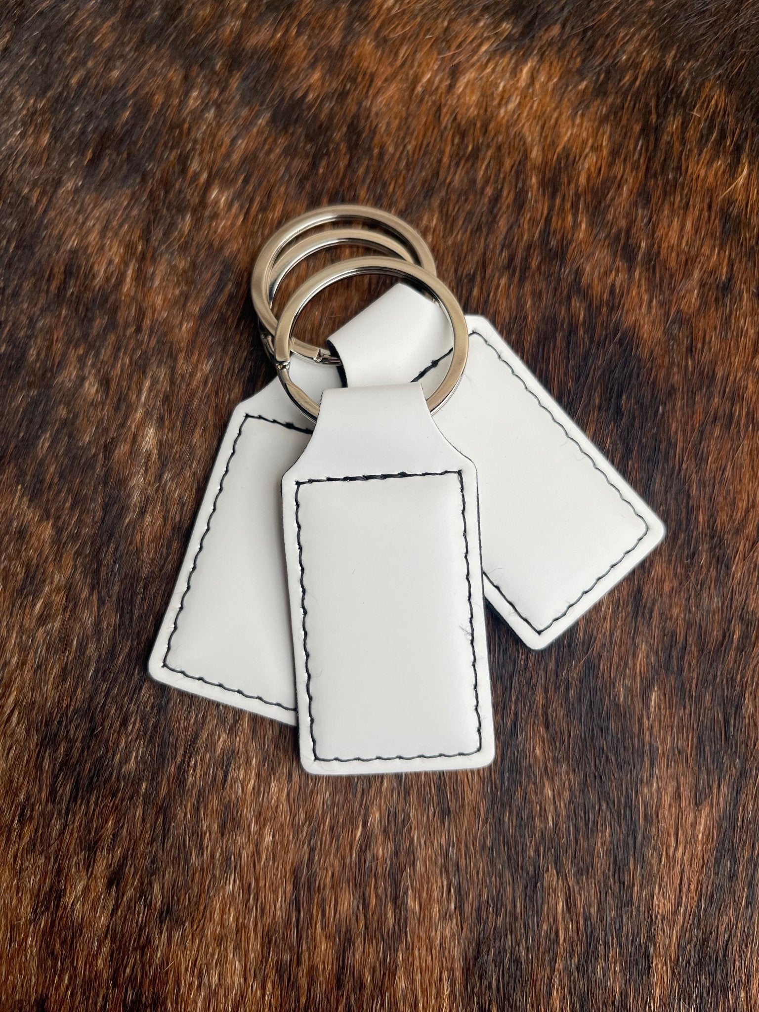 White Leatherette Keychains